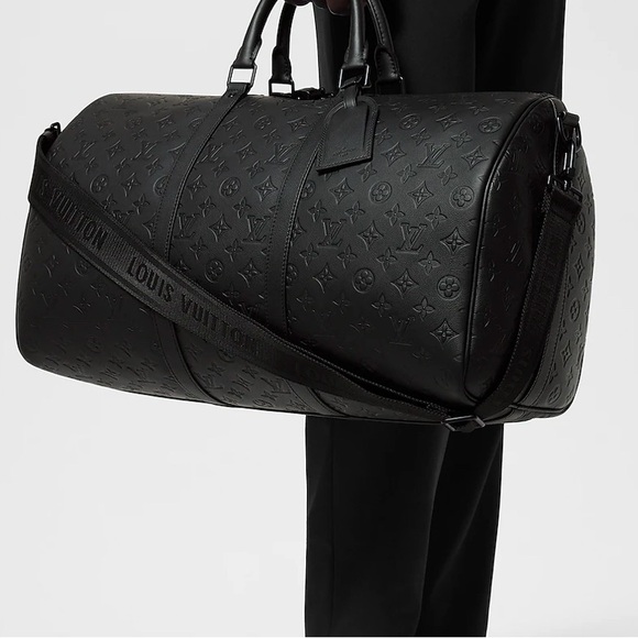 Louis Vuitton Black Duffel Bag with Monogram Pattern and Leather Material - Picture 10 of 10